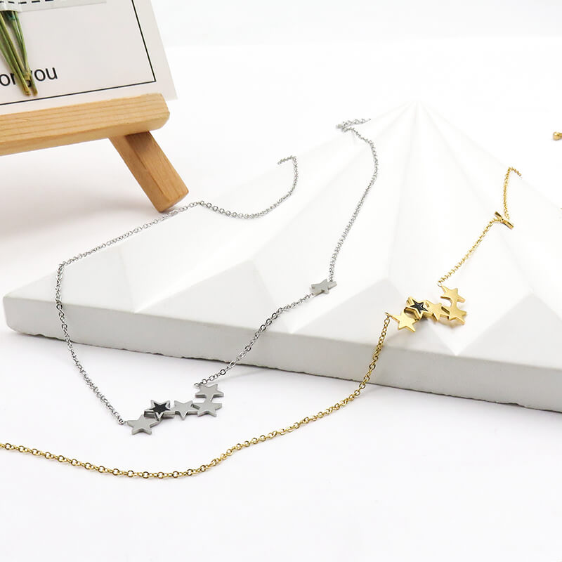 Modern Stainless Steel Star Necklace in Gold and Silver Tones Modern Stainless Steel Star Necklace in Gold and Silver Tones